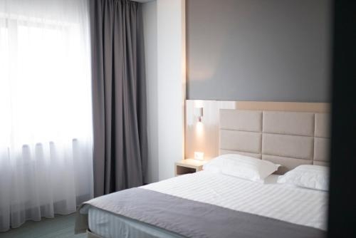 Imagen de la habitación del Hotel Capital, Tsemdolina. Foto 9