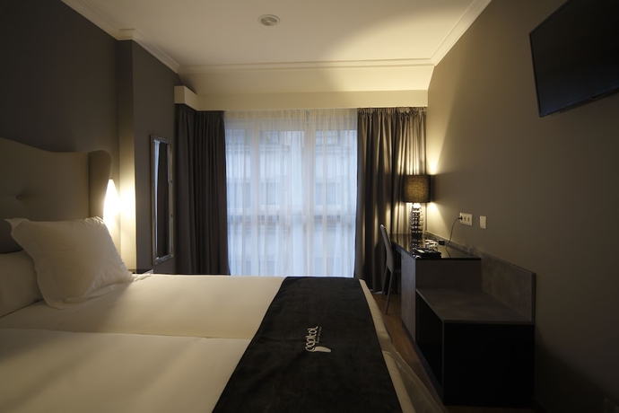 Imagen de la habitación del Hotel Capitol Boutique. Foto 11