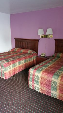 Imagen de la habitación del Hotel Capitol Inn And Suites. Foto 11