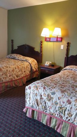 Imagen de la habitación del Hotel Capitol Inn And Suites. Foto 15