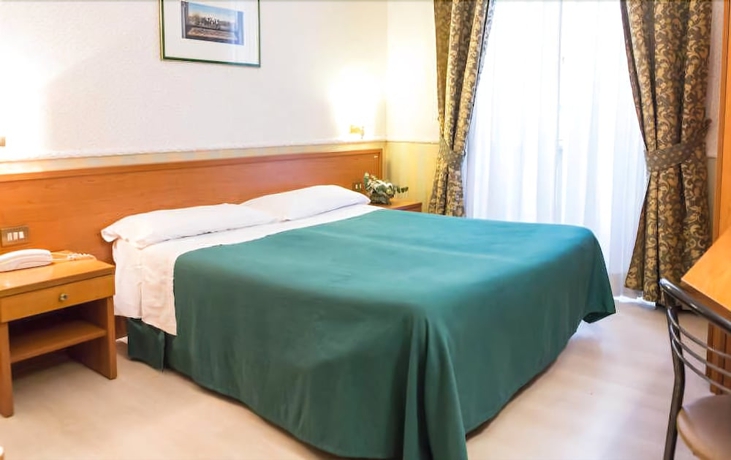 Imagen de la habitación del Hotel Capitol, Termini. Foto 11