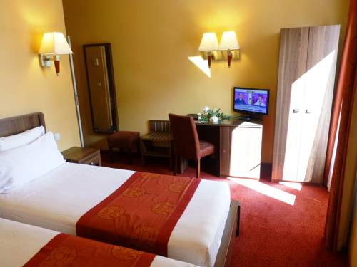 Imagen de la habitación del Hotel Capitole. Foto 4