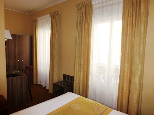 Imagen de la habitación del Hotel Capitole. Foto 10