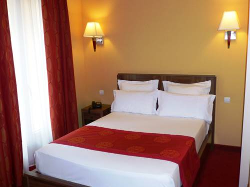 Imagen de la habitación del Hotel Capitole. Foto 13