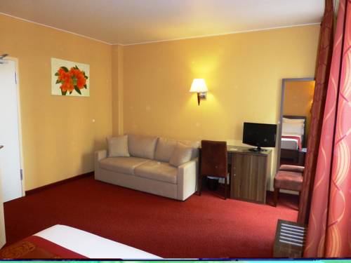 Imagen de la habitación del Hotel Capitole. Foto 14