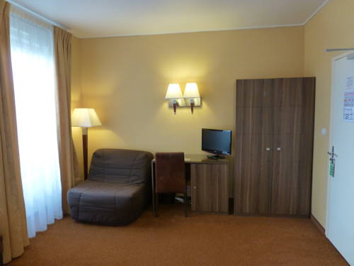 Imagen de la habitación del Hotel Capitole. Foto 15