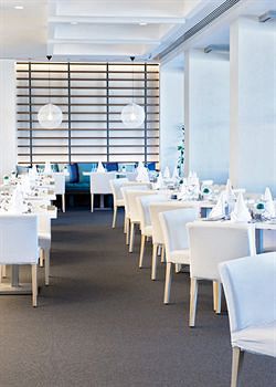 Imagen del bar/restaurante del Hotel Capo Bay. Foto 8