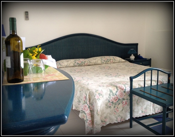 Imagen de la habitación del Hotel Capo Di Stella. Foto 2
