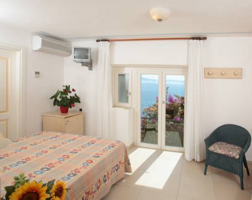 Imagen de la habitación del Hotel Capo D'uomo. Foto 7