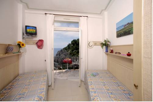Imagen de la habitación del Hotel Capo D'uomo. Foto 14