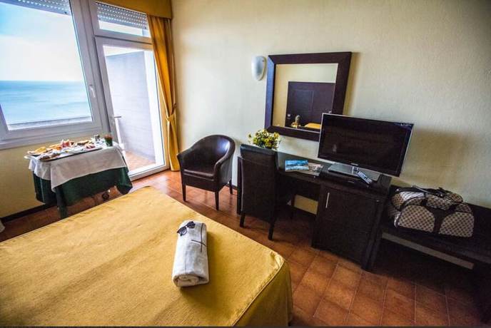 Imagen de la habitación del Hotel Capo Est. Foto 11