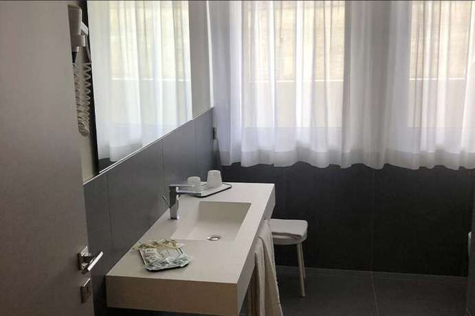 Imagen de la habitación del Hotel Capo Est. Foto 12