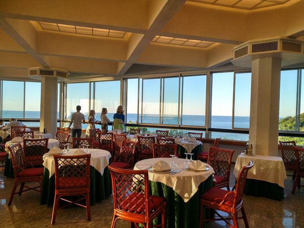 Imagen del bar/restaurante del Hotel Capo Est. Foto 8