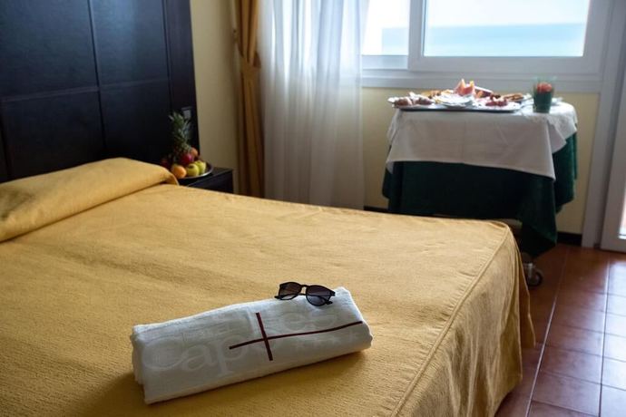 Imagen de la habitación del Hotel Capo Est. Foto 15