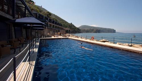 Imagen de la piscina del Hotel Capo La Gala and Wellness. Foto 9