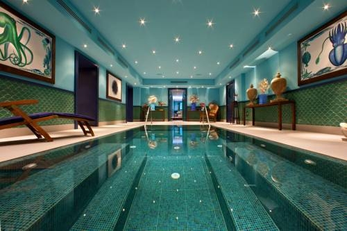 Imagen de la piscina del Hotel Capo La Gala and Wellness. Foto 10