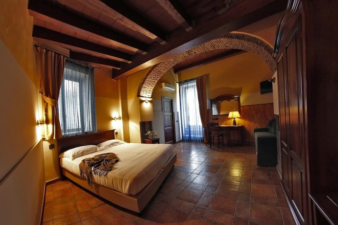 Imagen de la habitación del Hotel Capomulini Dimora Storica. Foto 6