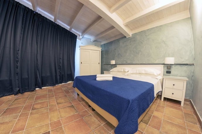 Imagen de la habitación del Hotel Capomulini Dimora Storica. Foto 7