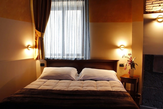 Imagen de la habitación del Hotel Capomulini Dimora Storica. Foto 9
