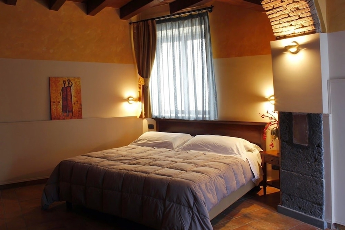 Imagen de la habitación del Hotel Capomulini Dimora Storica. Foto 10