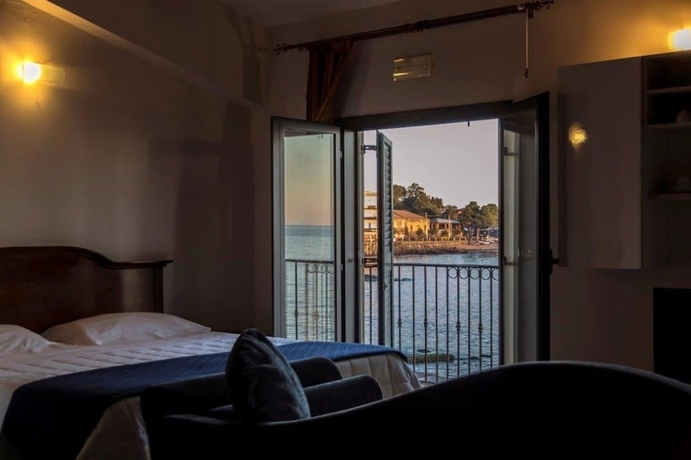 Imagen de la habitación del Hotel Capomulini Dimora Storica. Foto 12