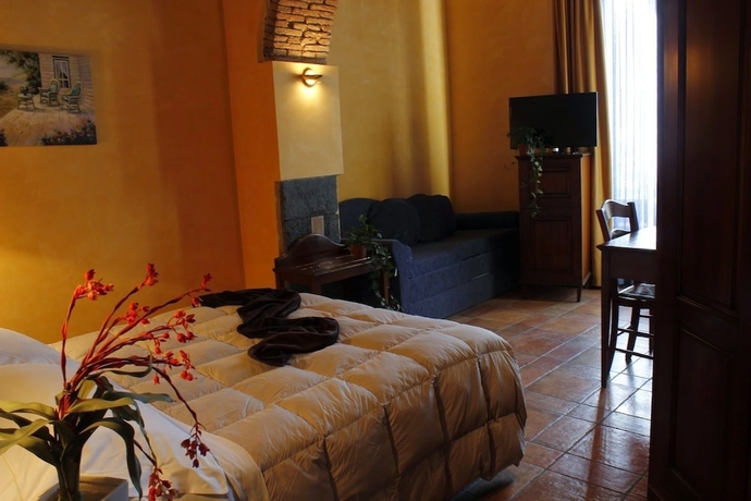 Imagen de la habitación del Hotel Capomulini Dimora Storica. Foto 14