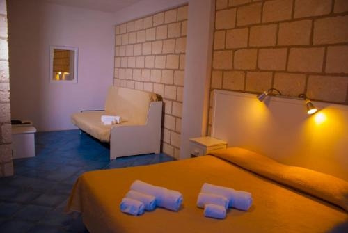 Imagen de la habitación del Hotel Caposperone Resort. Foto 9