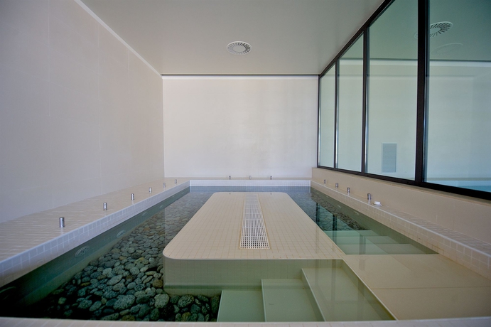 Imagen de la piscina del Hotel Capovaticano Resort Thalasso Spa. Foto 12