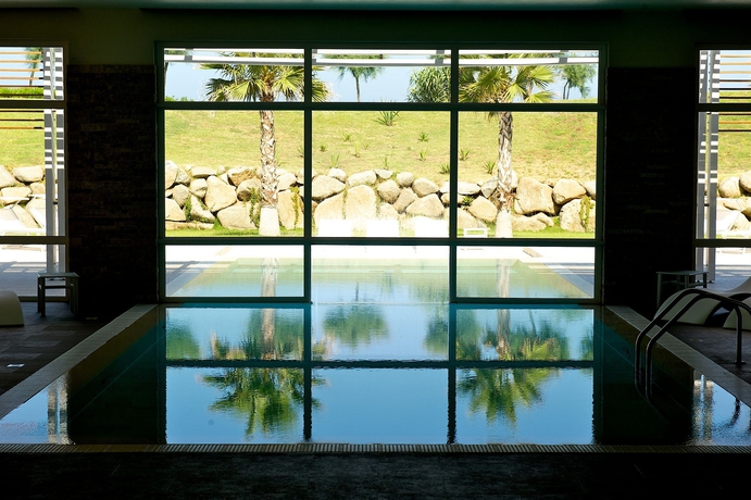 Imagen de la piscina del Hotel Capovaticano Resort Thalasso Spa. Foto 13