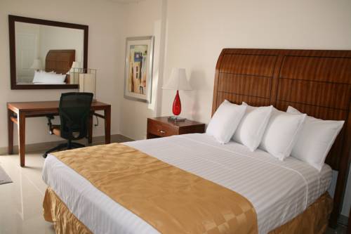 Imagen de la habitación del Hotel Capri Apartments. Foto 6