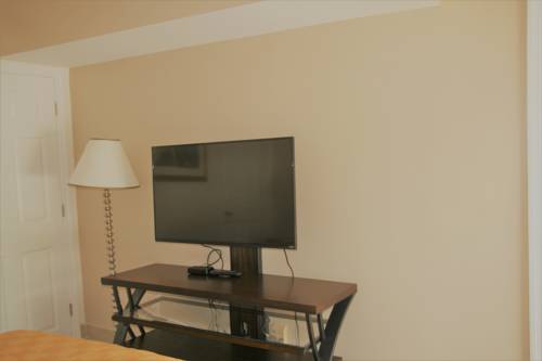 Imagen de la habitación del Hotel Capri Apartments. Foto 8