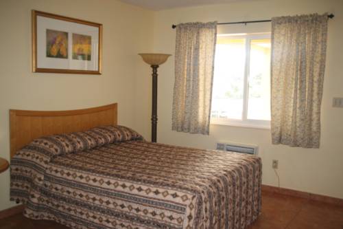 Imagen de la habitación del Hotel Capri Apartments. Foto 9