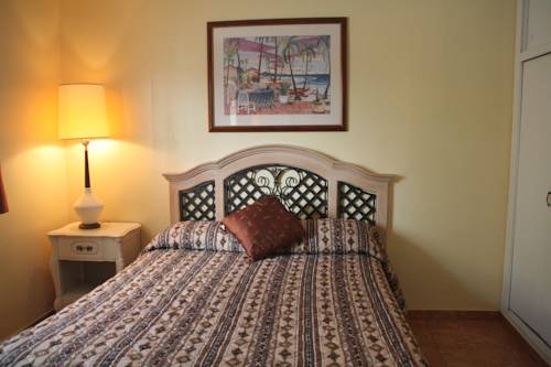 Imagen de la habitación del Hotel Capri Apartments. Foto 11