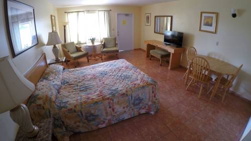 Imagen de la habitación del Hotel Capri Apartments. Foto 16