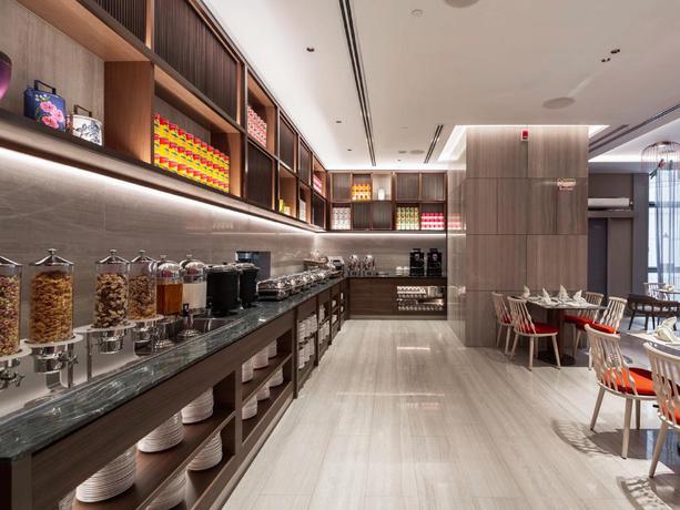 Imagen del bar/restaurante del Hotel Capri By Fraser China Square. Foto 3