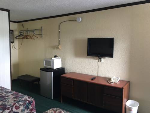 Imagen de la habitación del Hotel Capri By OYO Elwood, Wathena. Foto 2