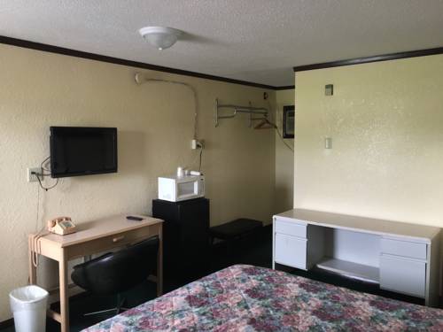 Imagen de la habitación del Hotel Capri By OYO Elwood, Wathena. Foto 4