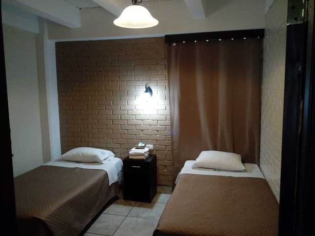 Imagen de la habitación del Hotel Capri, Ciudad de Guatemala. Foto 9