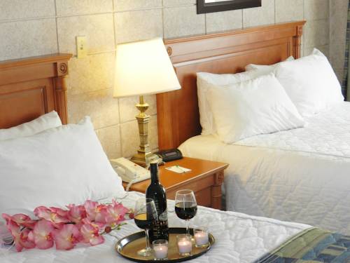 Imagen de la habitación del Hotel Capri Inn, St. Catharines. Foto 11