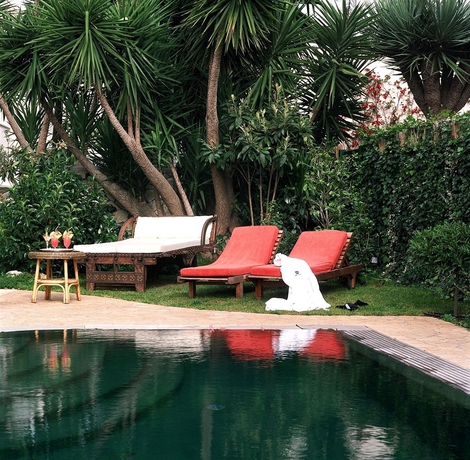 Imagen de la piscina del Hotel Capri Palace Jumeirah. Foto 16