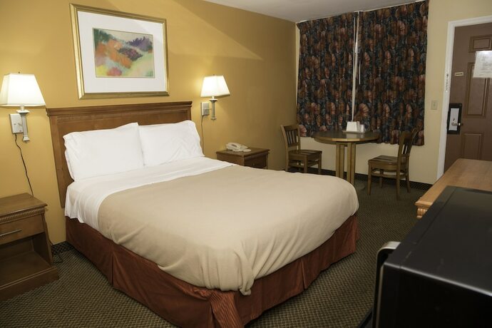 Imagen de la habitación del Hotel Capri inn and Suites. Foto 13