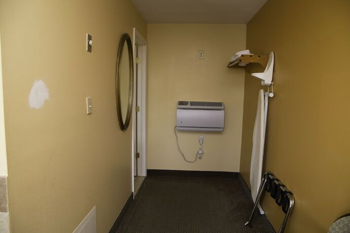 Imagen de la habitación del Hotel Capri inn and Suites. Foto 15