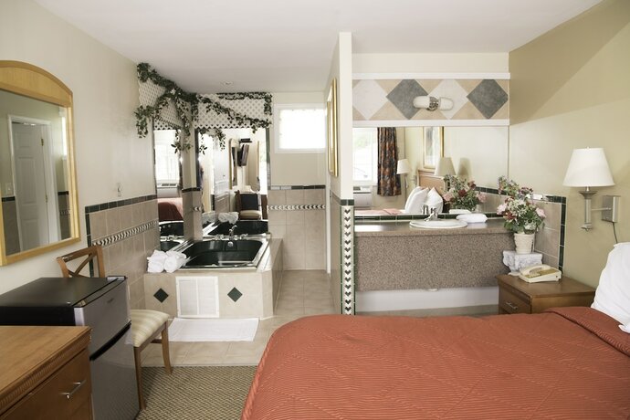 Imagen de la habitación del Hotel Capri inn and Suites. Foto 16