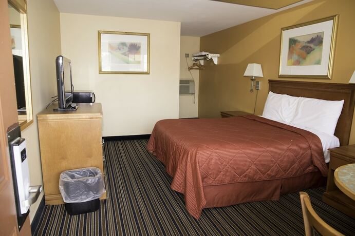 Imagen de la habitación del Hotel Capri inn and Suites. Foto 18
