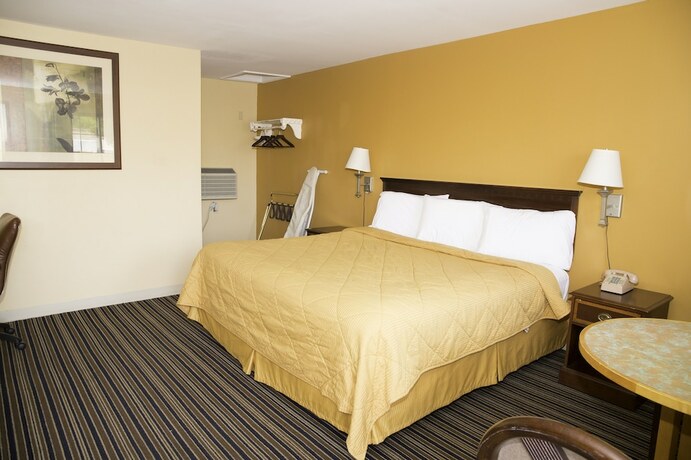 Imagen de la habitación del Hotel Capri inn and Suites. Foto 19