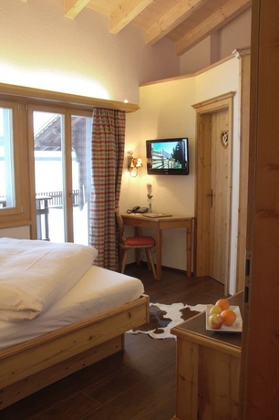 Imagen de la habitación del Hotel Caprice, Grindelwald. Foto 5