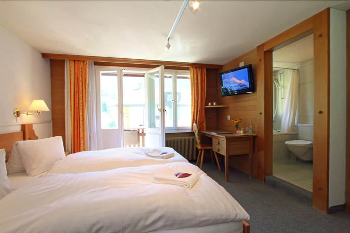 Imagen de la habitación del Hotel Caprice, Grindelwald. Foto 9