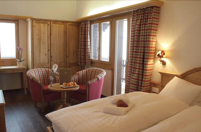 Imagen de la habitación del Hotel Caprice, Grindelwald. Foto 15