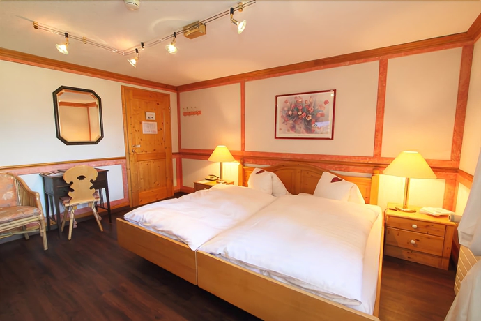 Imagen de la habitación del Hotel Caprice, Grindelwald. Foto 16