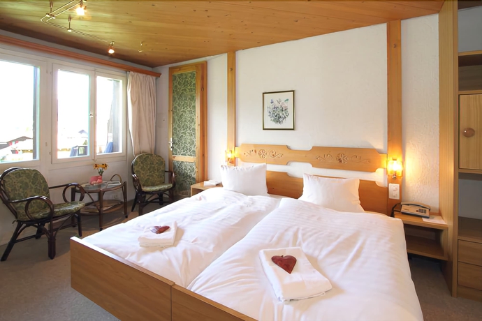 Imagen de la habitación del Hotel Caprice, Grindelwald. Foto 17